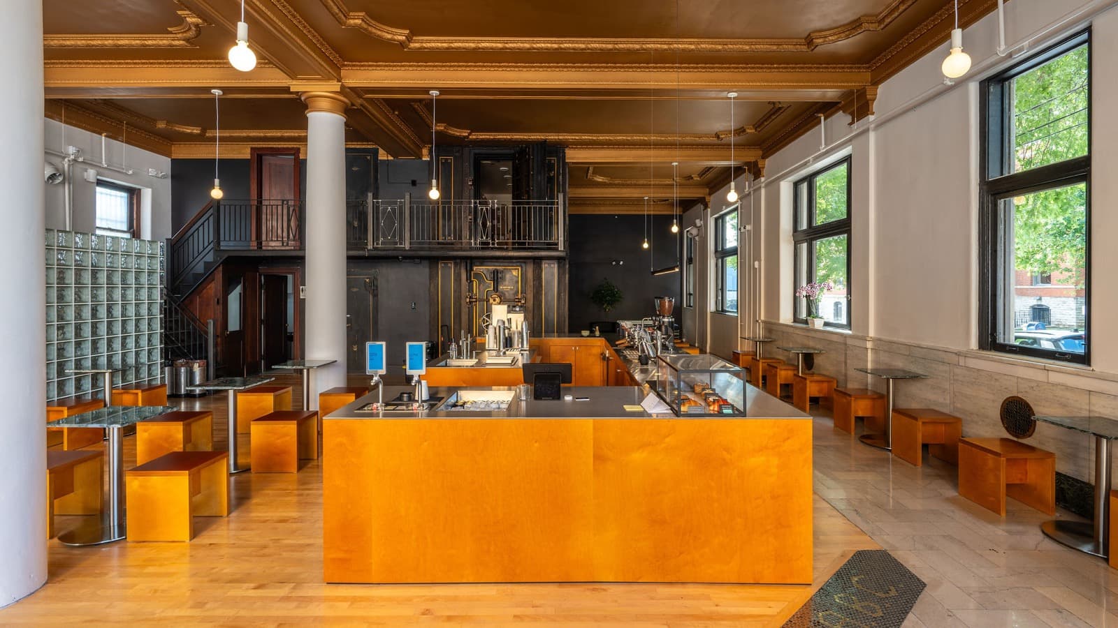 Locke Coffee service counter head-on with the historic bank vault wall behind it, in Newport, Kentucky near Cincinnati